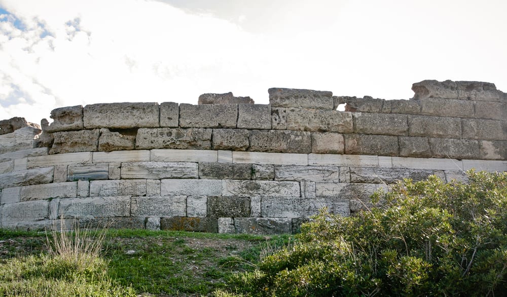 The Temple of Poseidon at Cape Sounion, 444 BC, standing on the southernmost tip of the Athens Riviera, the Aegean Sea behind.