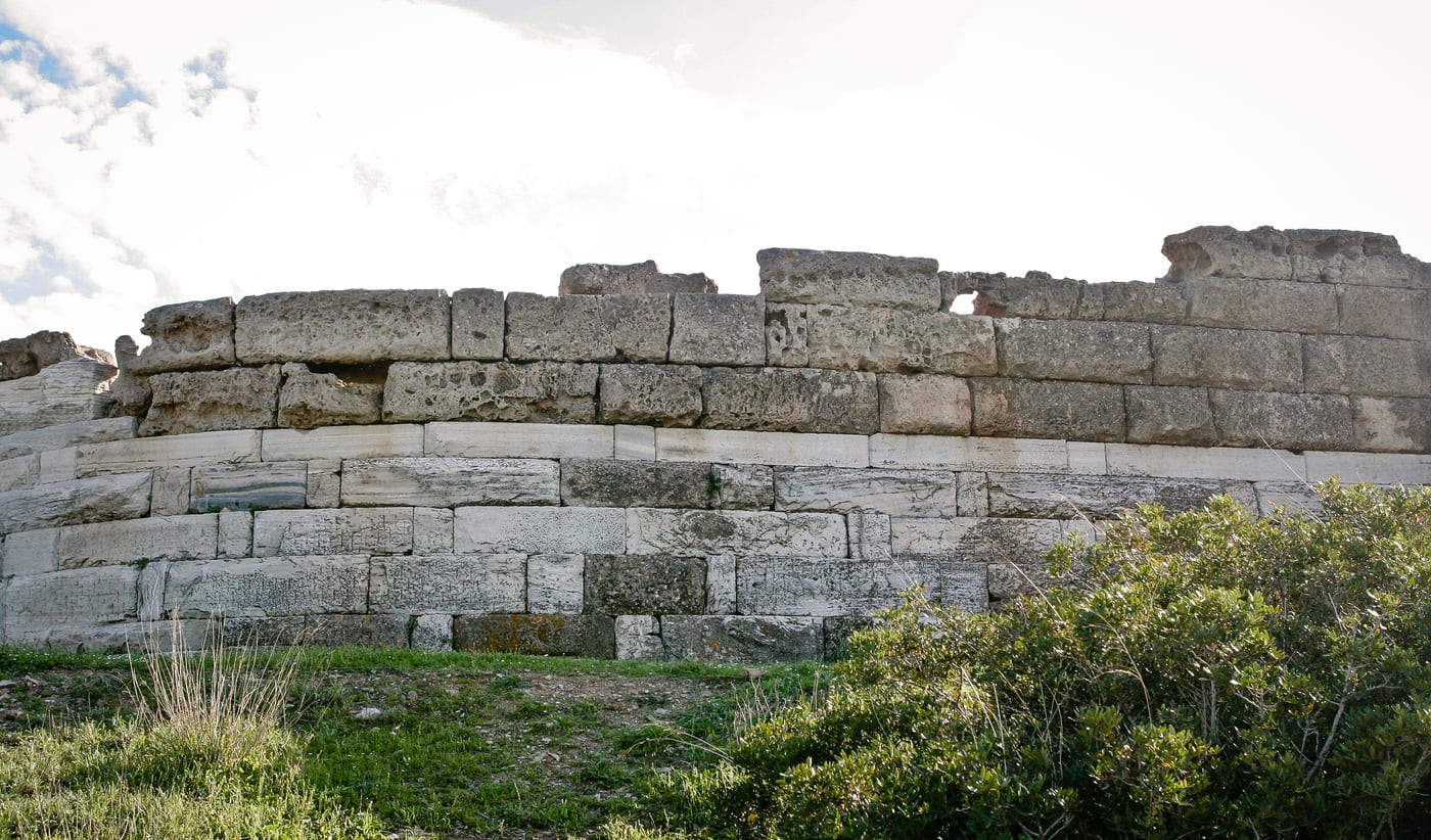 The Temple of Poseidon at Cape Sounion, 444 BC, standing on the southernmost tip of the Athens Riviera, the Aegean Sea behind.