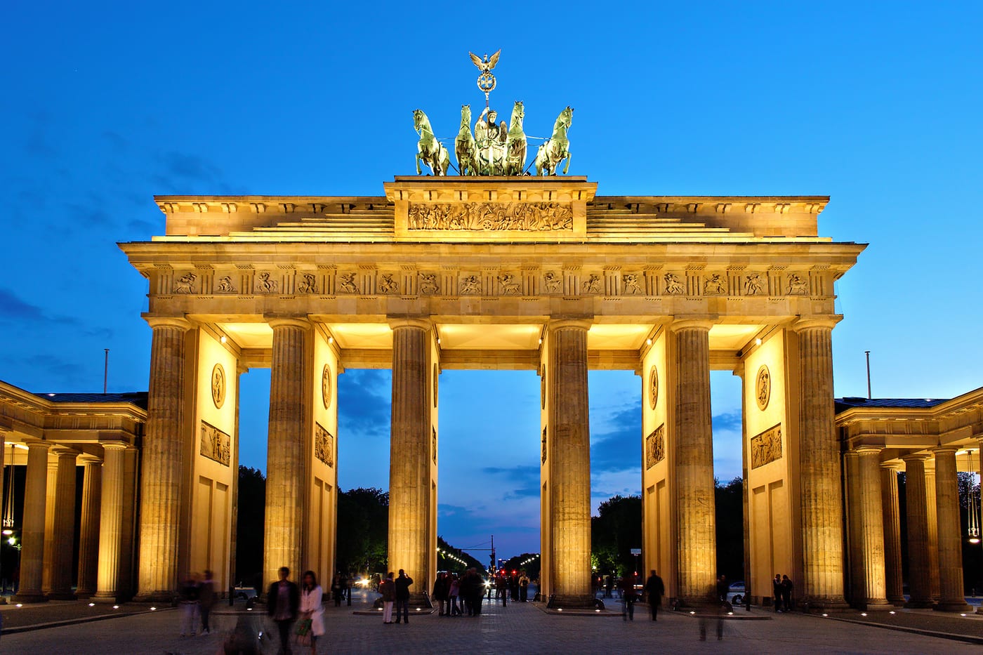 The Brandenburg Gate in Berlin at evening light. Berlin is Christian Angermayer's German national base and one of the four Apeiron Investment Group offices.