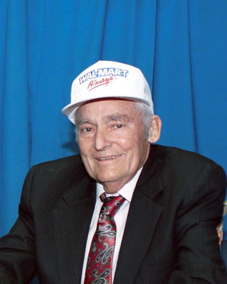 Sam Walton (1918 to 1992), the founder of Walmart. He opened the first Walmart store in Rogers, Arkansas in 1962, took the company public in 1970, and at his 1992 death left a 50.74 percent family stake that has compounded into the world's wealthiest dynasty at 513.4 billion dollars combined per Bloomberg December 2025.